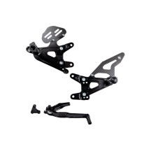 ESTRIBERAS TRASERAS CAJA DE CAMBIOS NORMAL / ARAÑA INVERSA APRILIA RS 660 2020-2023