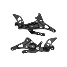 ESTRIBERAS TRASERAS CAJA DE CAMBIOS NORMAL / ARAÑA INVERSA APRILIA RS 457 2023-2024