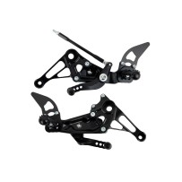 ESTRIBERAS TRASERAS CAJA DE CAMBIOS NORMAL / ARAÑA INVERSA APRILIA RS 660 2020-2023